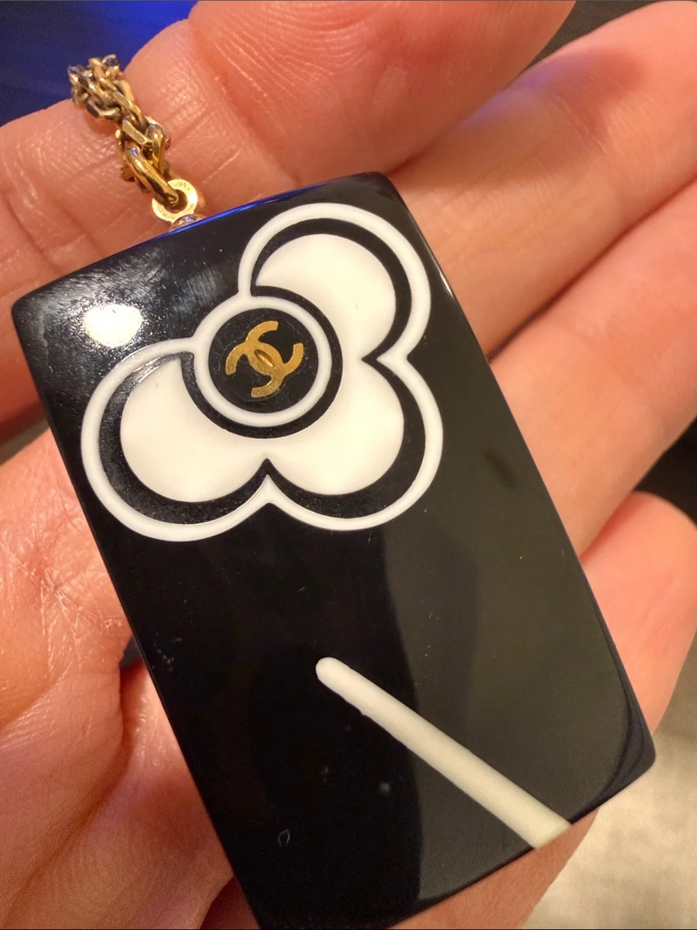 CHANEL Black and White Camellia Pendant with Gold Chain